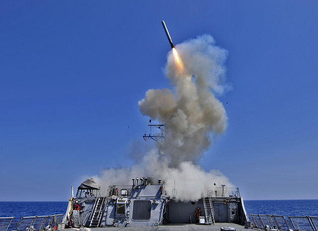 A U.S. Navy Destroyer fires a Tomohawk Cruise Missile. 