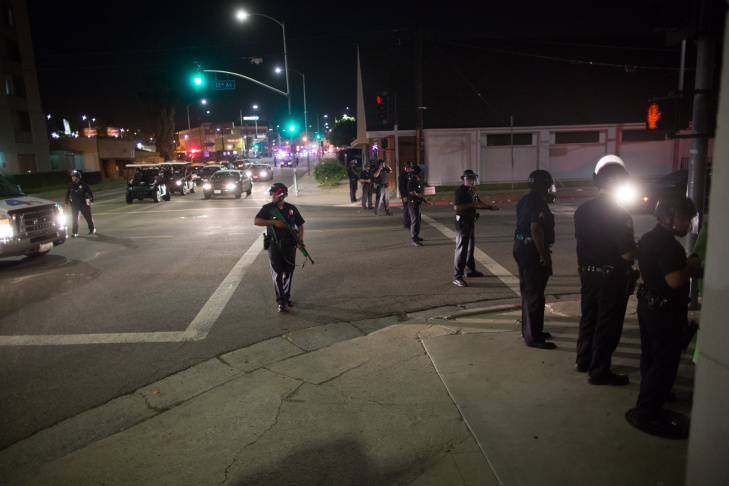 Police disperse protesters in Los Angeles // Credit: Mae Ryan/KPCC